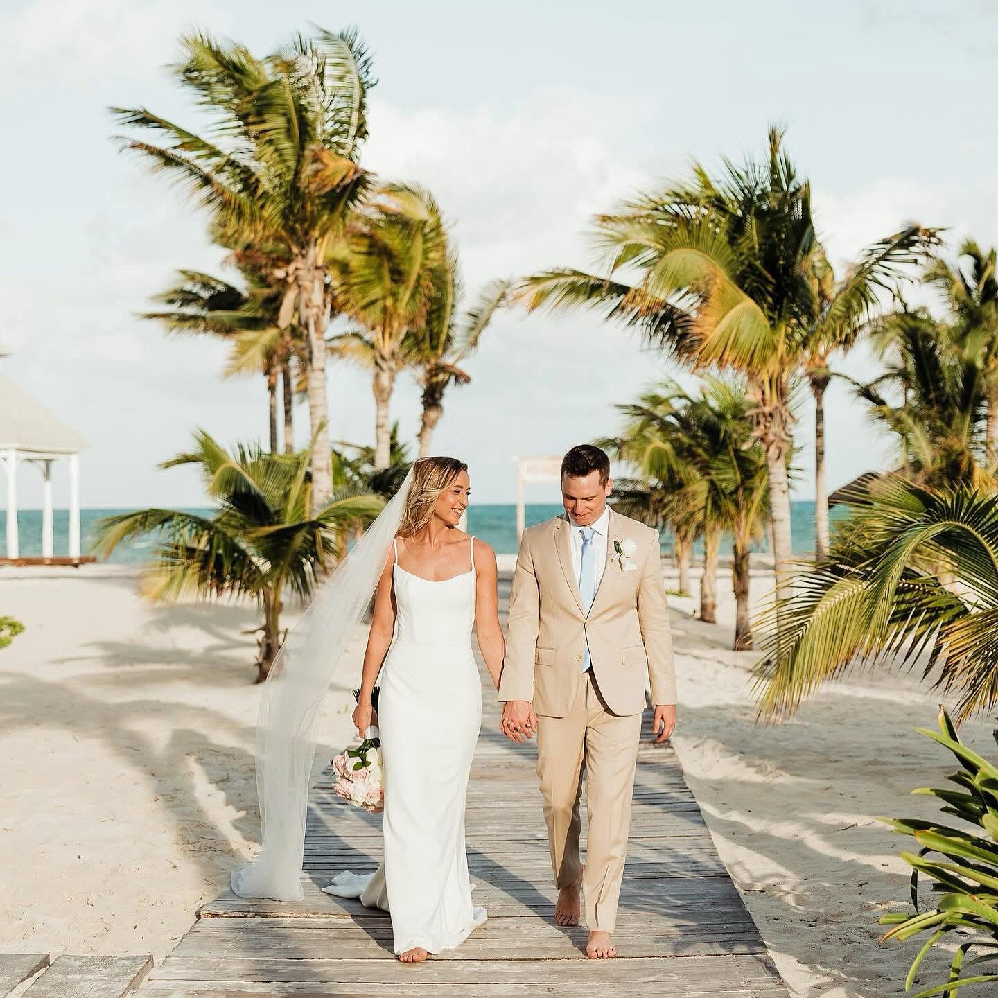 couple who had to decide between a cabo vs cancun wedding