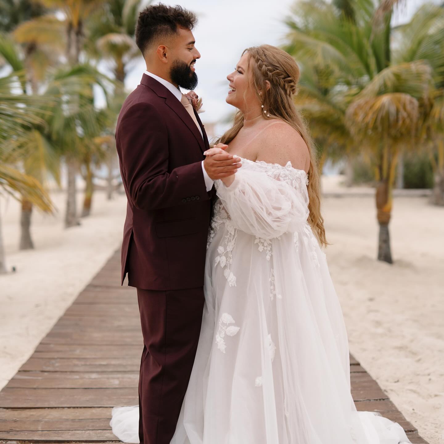 a couple who learned a cancun destination wedding cost