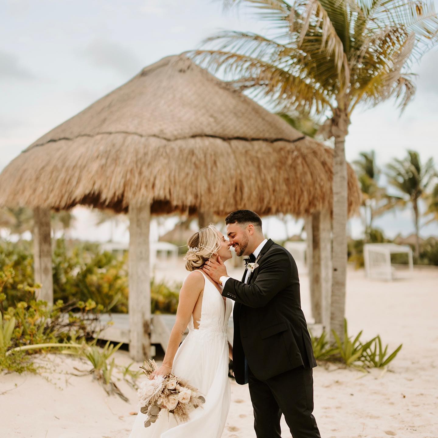 a couple who asked themselves, how much does a destination wedding cost in cancun