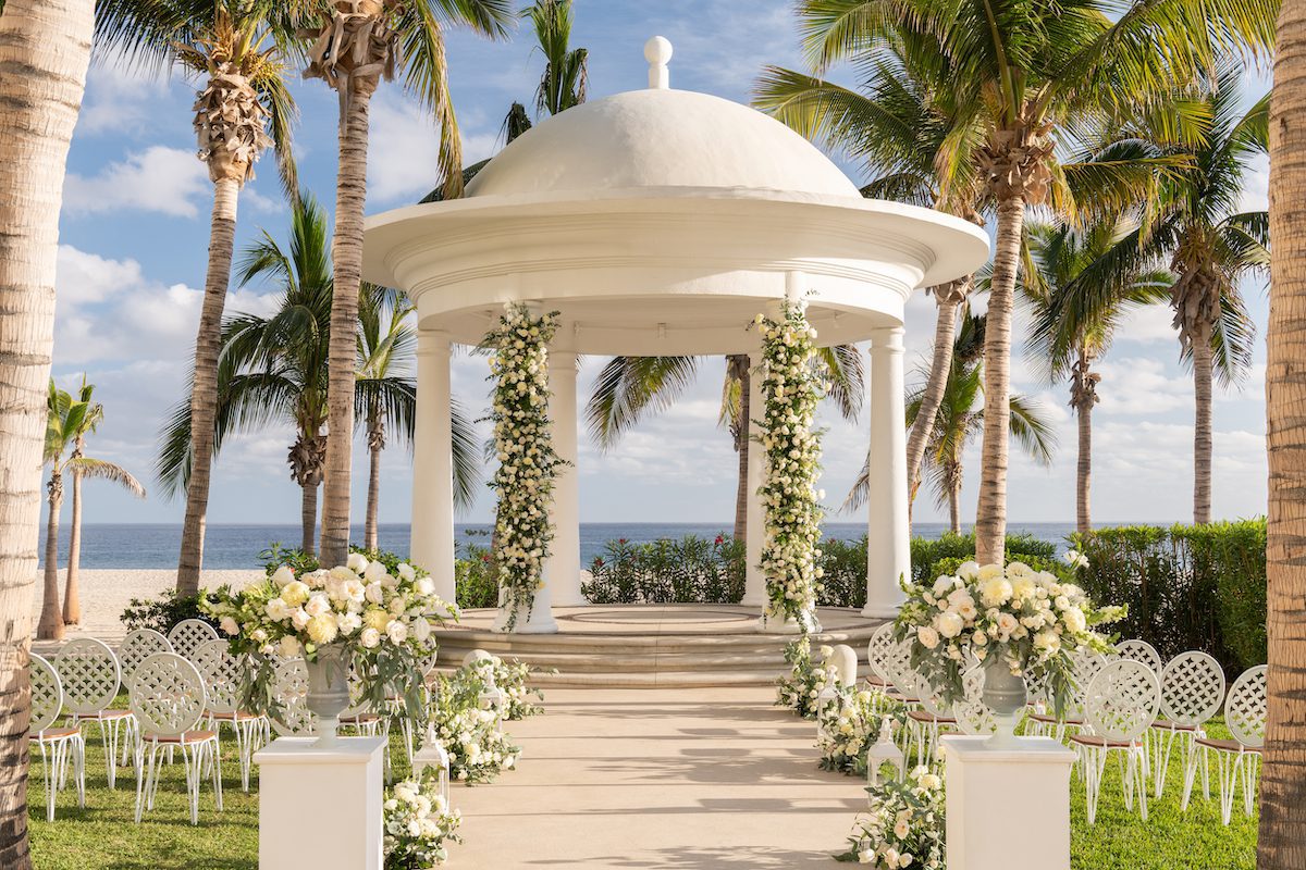 a photo to help you decide between cancun or cabo for your destination wedding